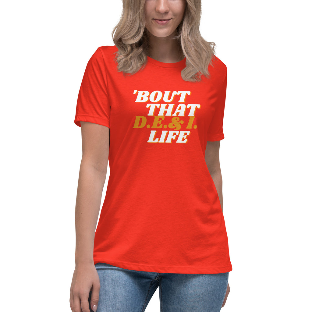 Orange t-shirt.  Bout That D.E.I . Life written on the front