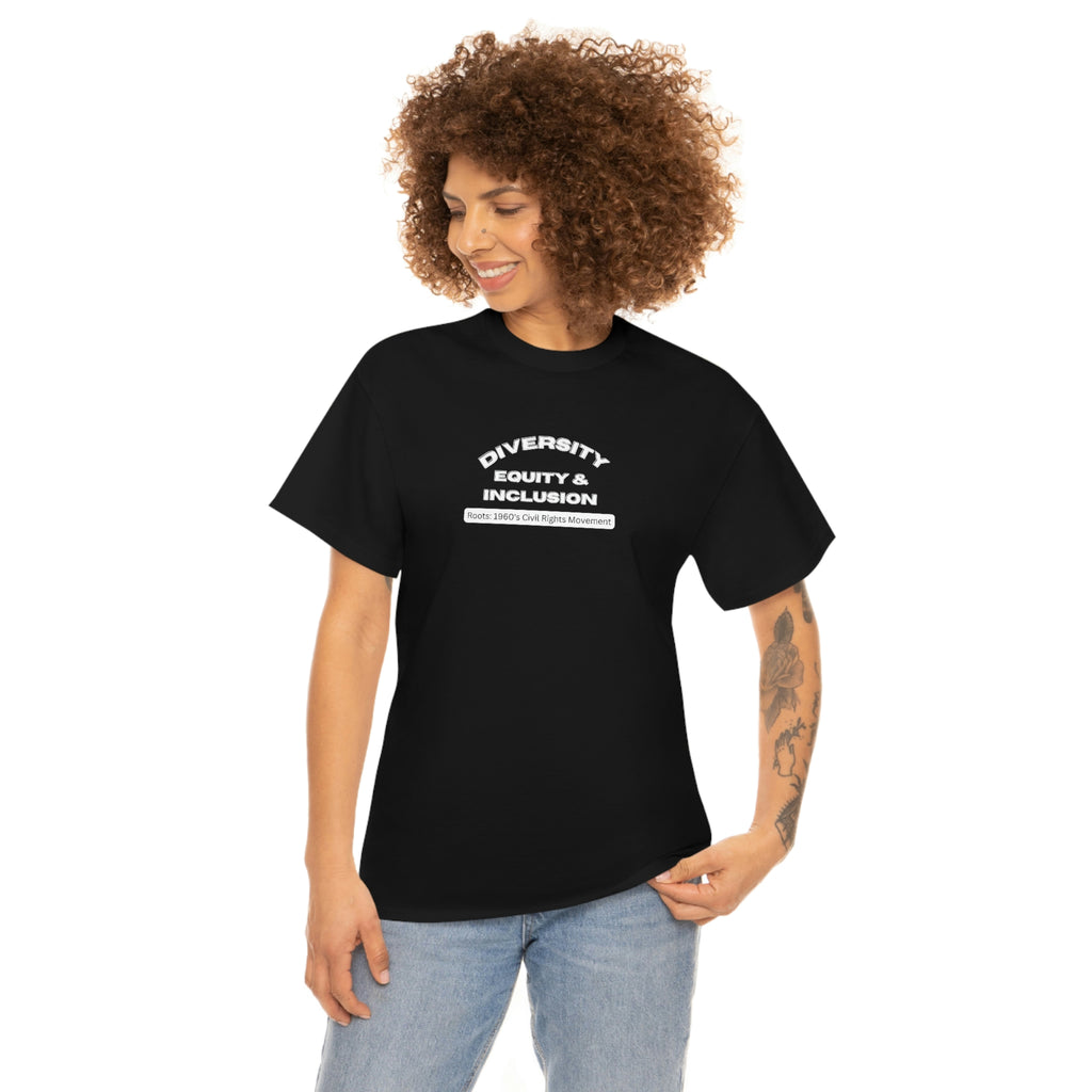 Model wearing black t-shirt with lettering In bold capital white letters on the front "Diversity Equity & Inclusion" below these letters on a rounded white background strip with mixed case black letters "roots: 1960's Civil Rights Movement"