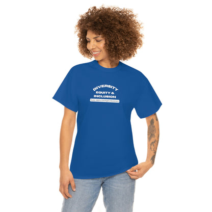 Female model wearing royal blue t-shirt with lettering In bold capital white letters on the front "Diversity Equity & Inclusion" below these letters on a rounded white background strip with mixed case black letters "roots: 1960's Civil Rights Movement"